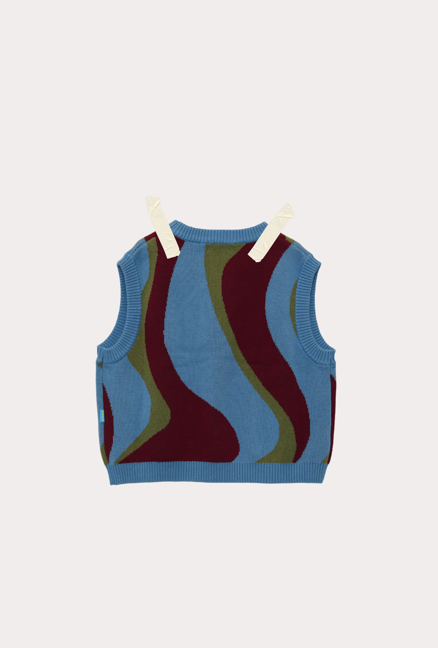 back of Colorful sleeveless Johnny sweater vest on a light gray background