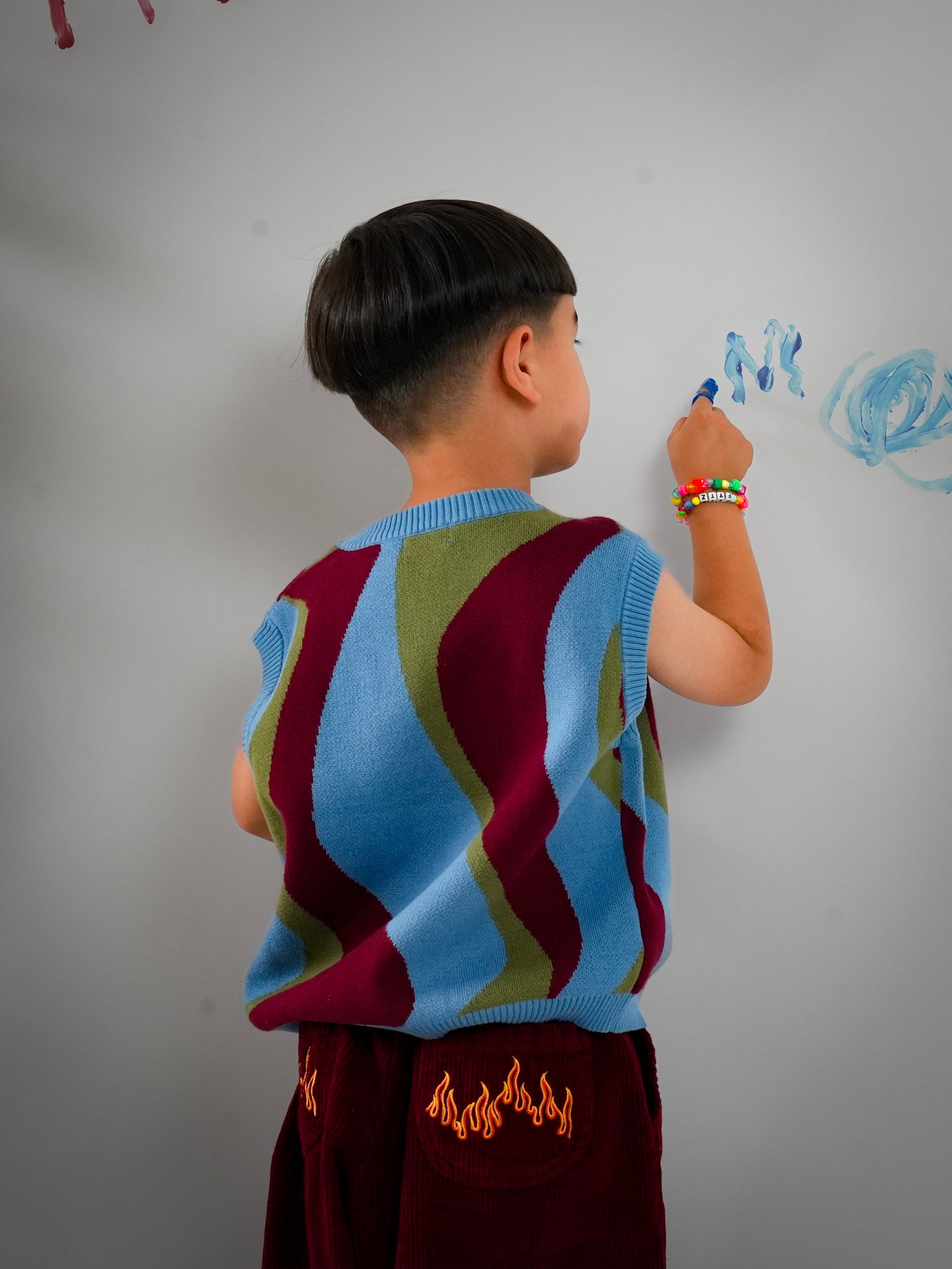 Child modelling kids Johnny sleeveless knit vest — From Y To Z kidswear NZ