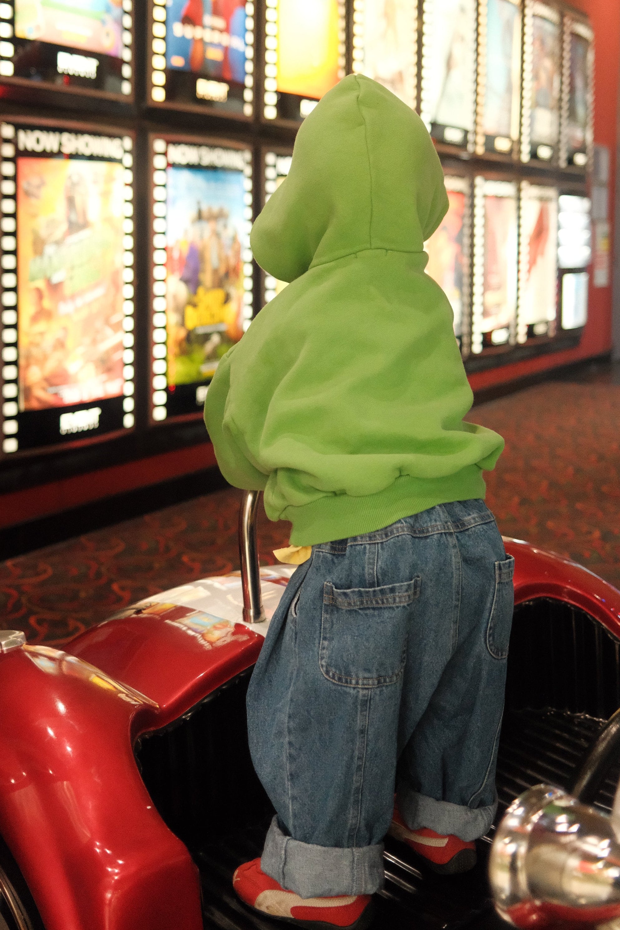 Toddler in cinema wearing ruhi denim jean in true blue